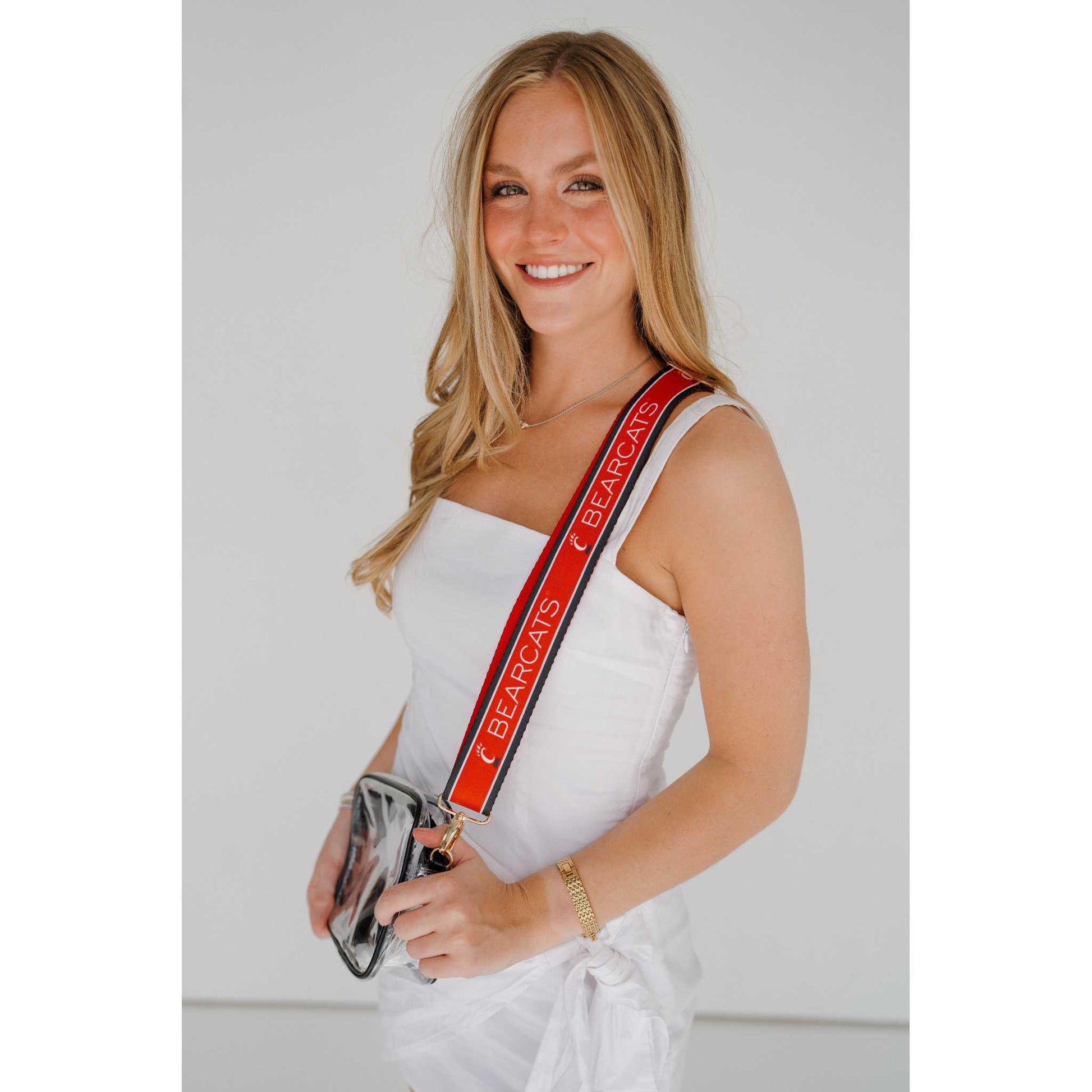 Stylishly showcase your team spirit with the Bridget Clear Purse with Patterned Shoulder Straps - Cincinnati Bearcats.