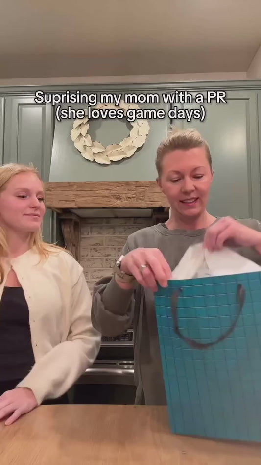 The sweetest thing we’ve seen this year! 🤍 @ava.krause05 gave her mom the ultimate gift and she’s going to be the most stylish one at the stadium. We love that first reaction! Our newest Sara Clear Bag isn’t just for college students but for every game day girl. And yes, she’s bigger than Clara clear purse.

Available in plain team colors or with a matching Skinny Scarf. She drops very very SOON. Comment VIP to join the waitlist and get access first! 👇

#collegegameday #gamedaystyle #momsofinsta #momandda